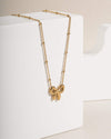 Delicate Gold Tone Bow Pendant Necklace