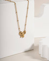 Delicate Gold Tone Bow Pendant Necklace