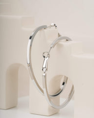 Modern Silver-Toned Flat Hoop Earrings