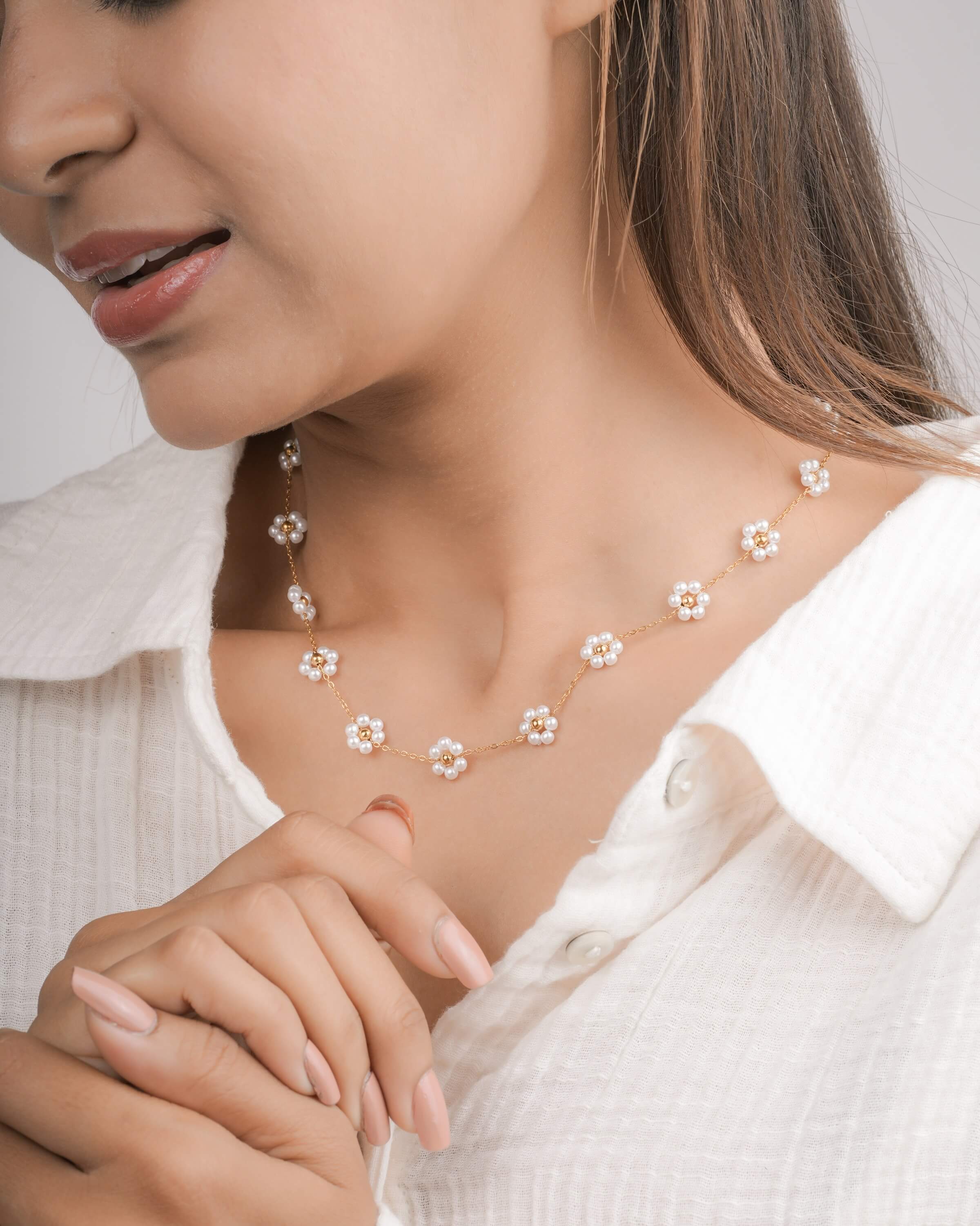 Delicate Pearl Flower Necklace in Gold Tone