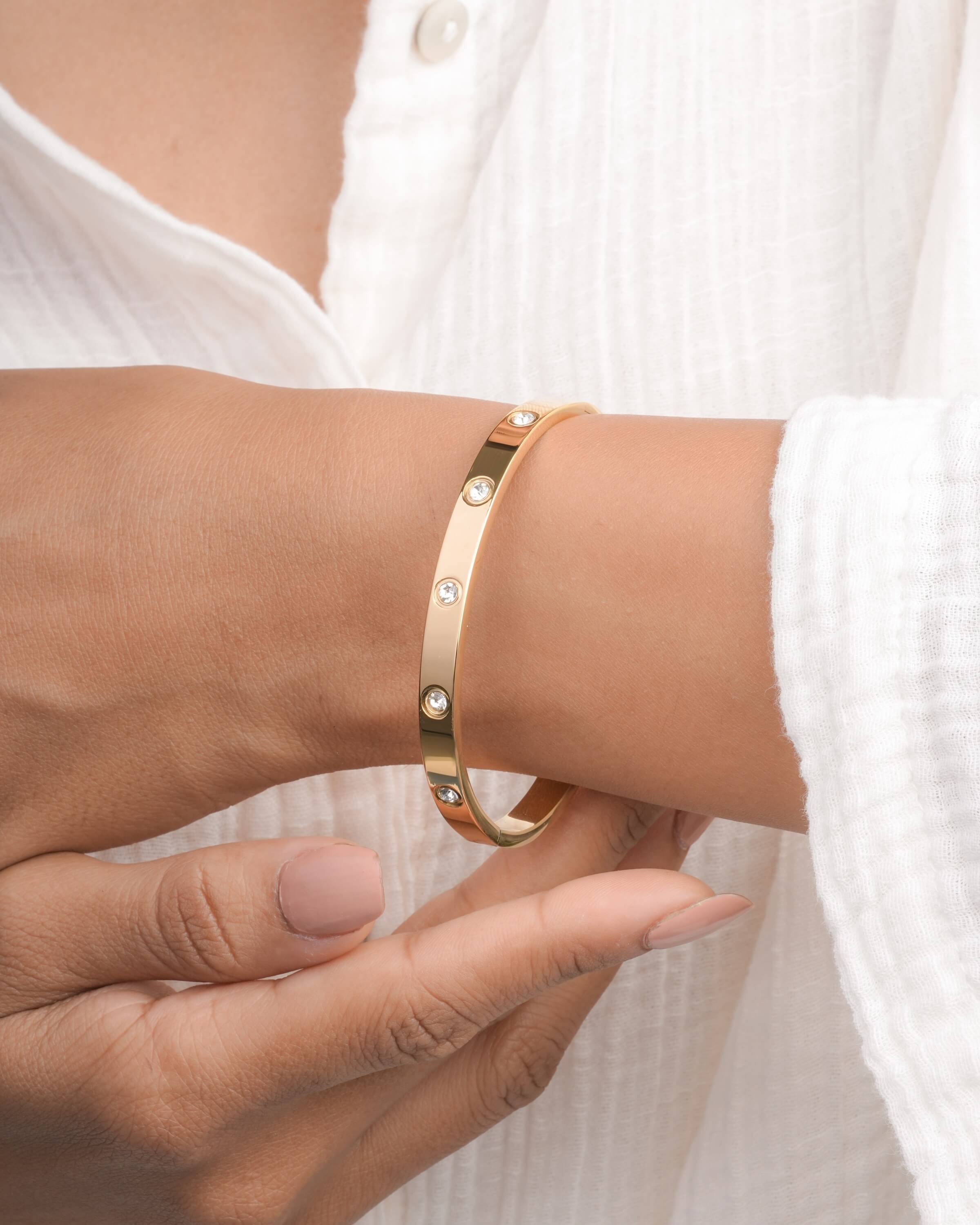 Elegant Gold Bangle with Crystal Accents