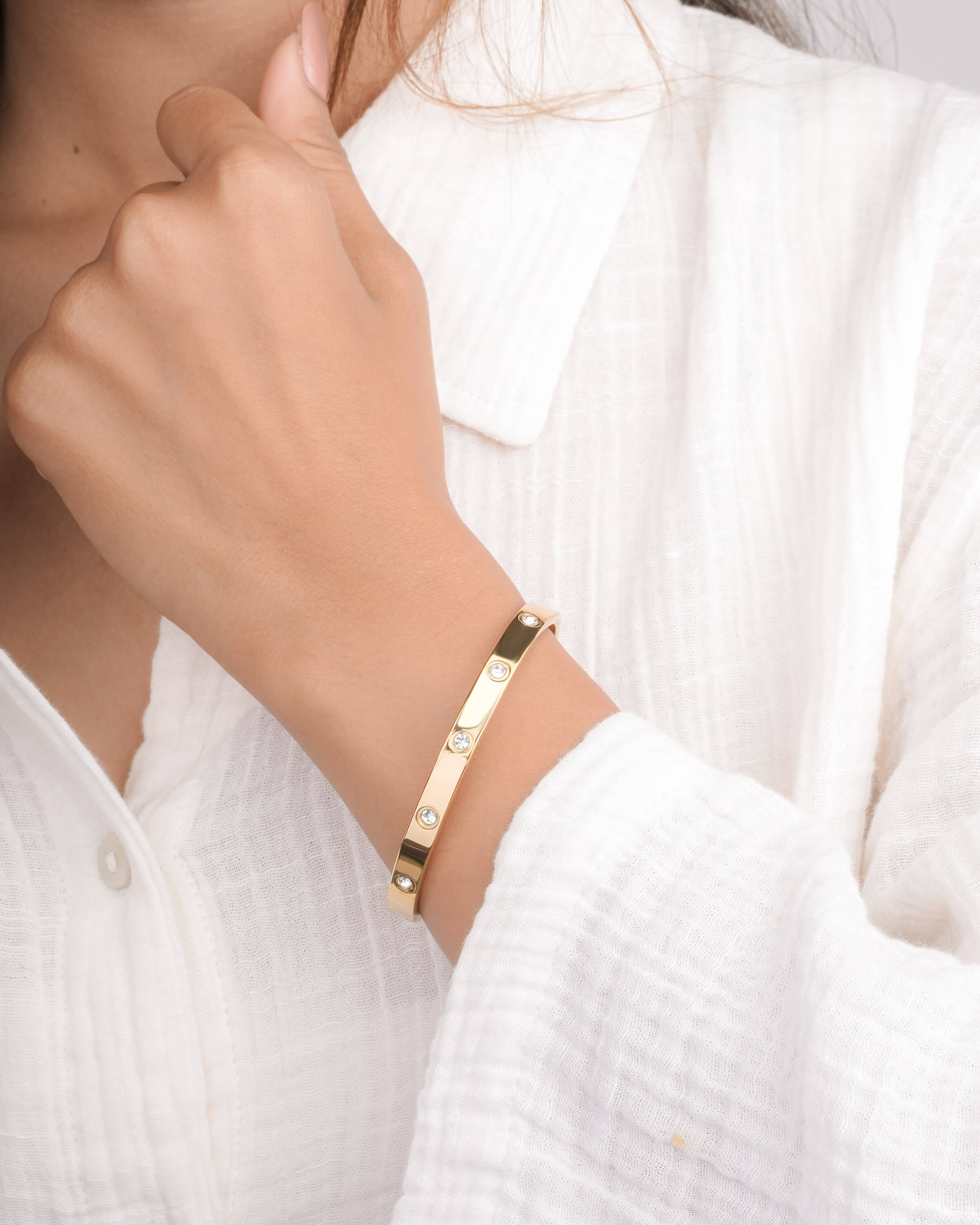 Elegant Gold Bangle with Crystal Accents