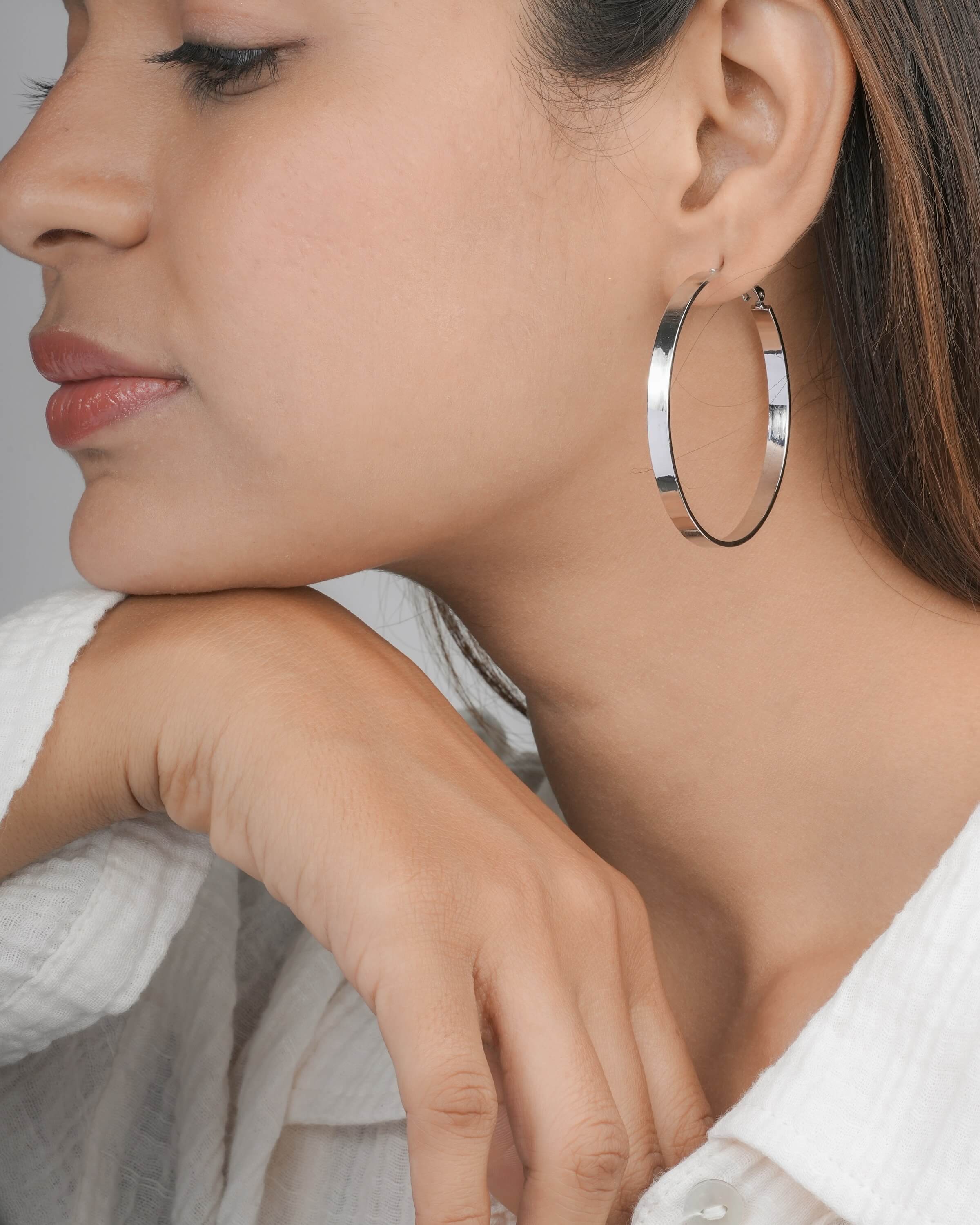 Modern Silver Toned Flat Hoop Earrings