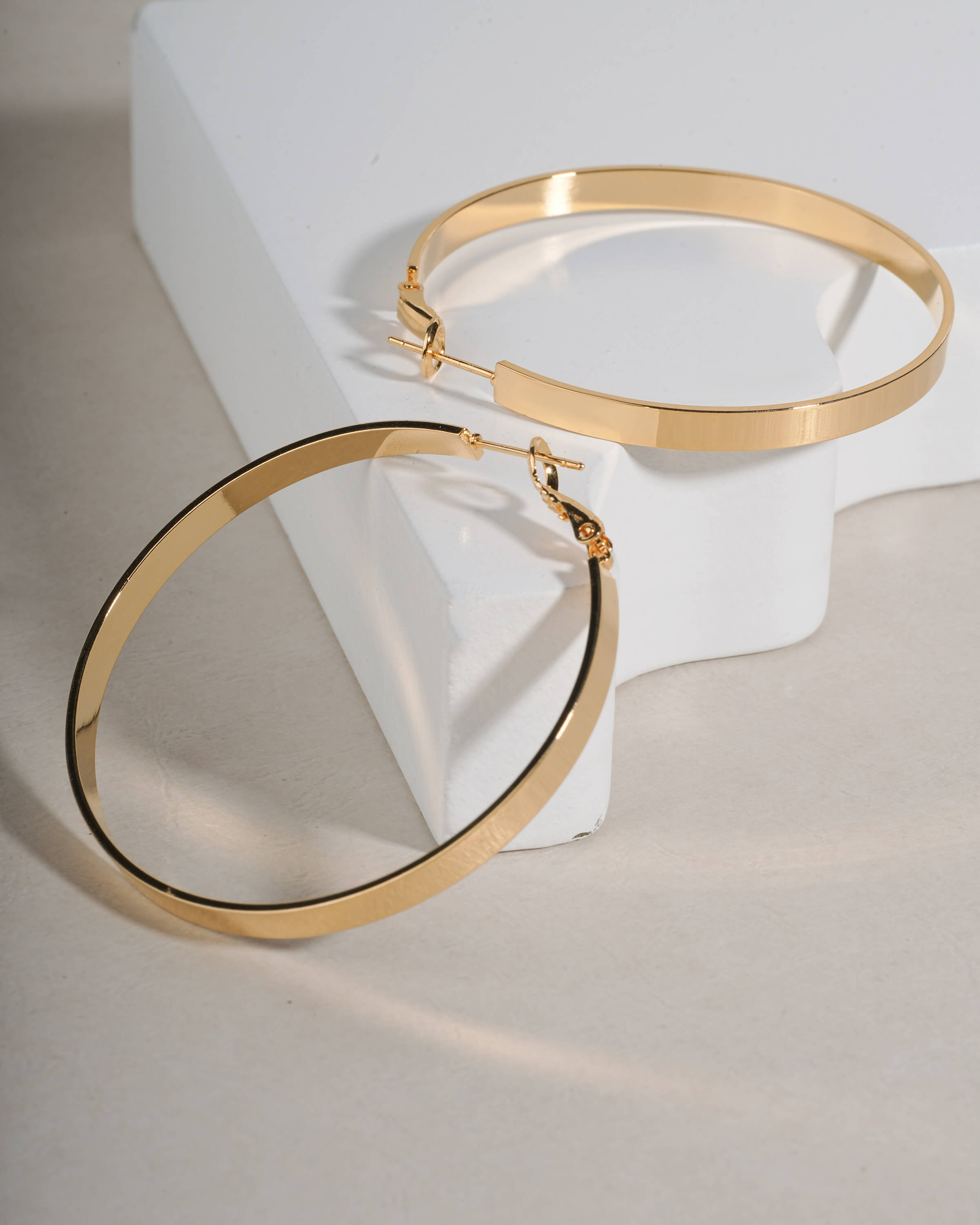 Modern Gold Toned Flat Hoop Earrings